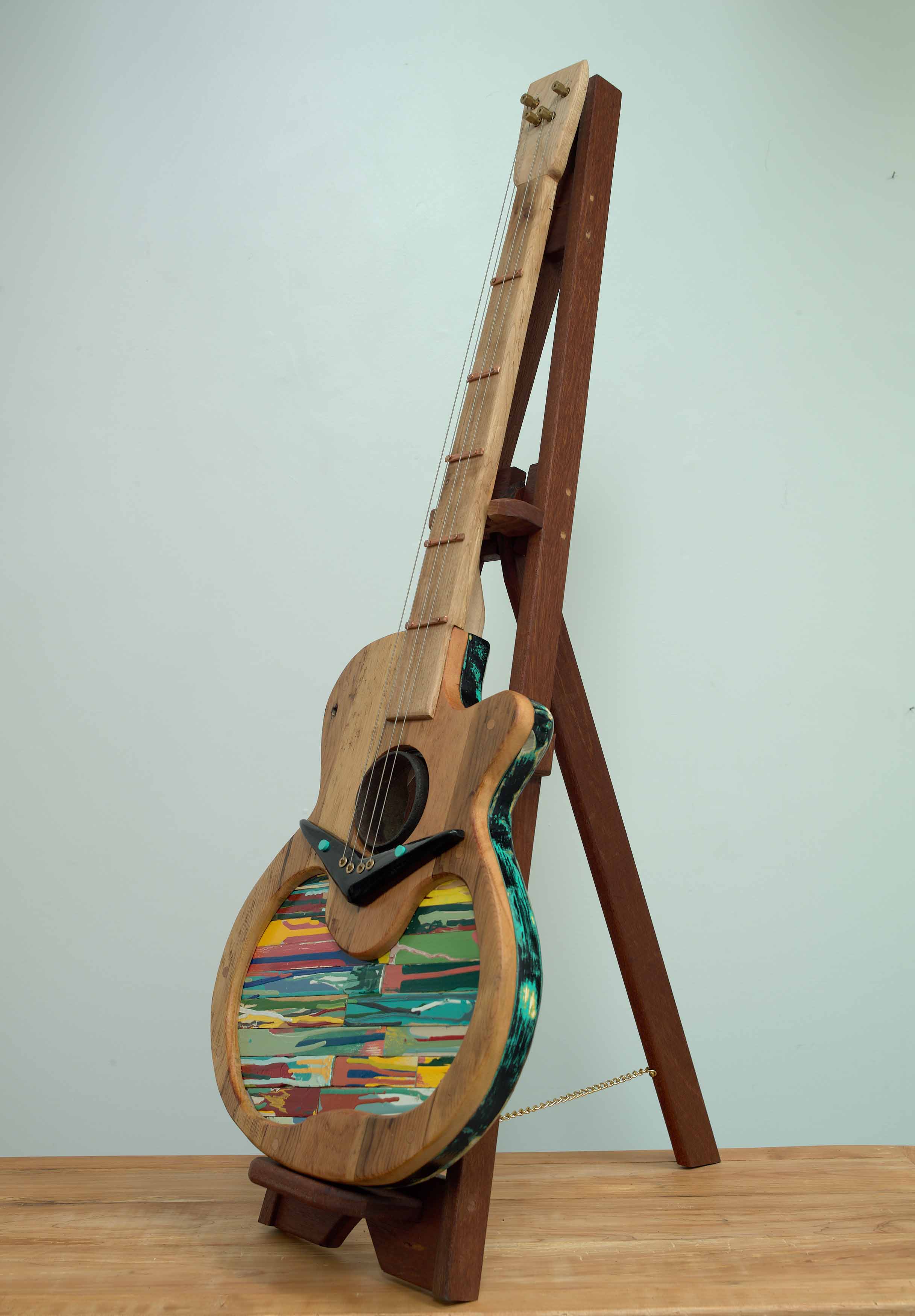 Air Guitar  2025, mixed wood, mixed metal, oil paint and paint sticks, 44.75 x 16 x 22 inches