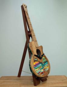Air Guitar  2025, mixed wood, mixed metal, oil paint and paint sticks, 44.75 x 16 x 22 inches